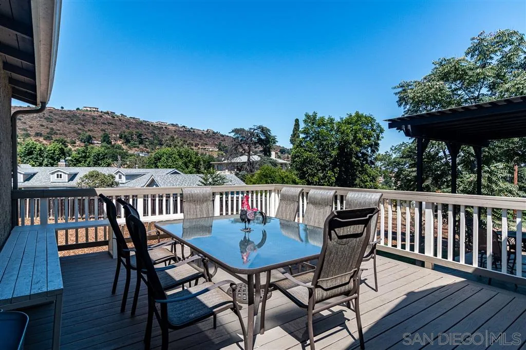 8648 Almond Road Lakeside, CA 92040 - Photo 13 of 15 a view of a chairs and table on the wooden floor