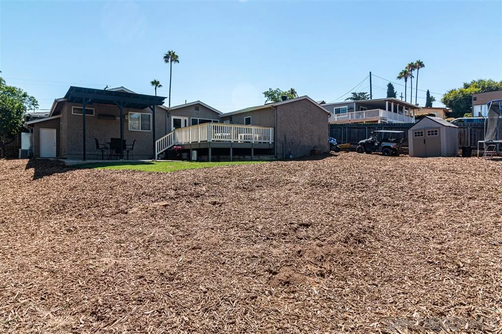 8648 Almond Road Lakeside, CA 92040 - Photo 15 of 15 a front view of a house with a yard