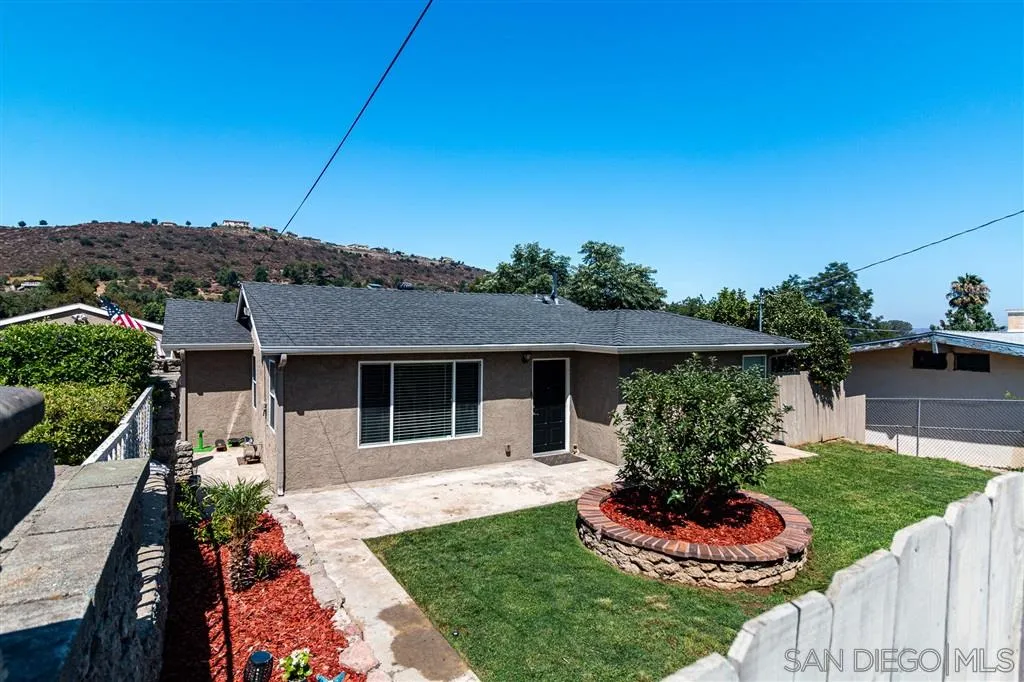 8648 Almond Road Lakeside, CA 92040 - Photo 2 of 15 a view of a house with a yard