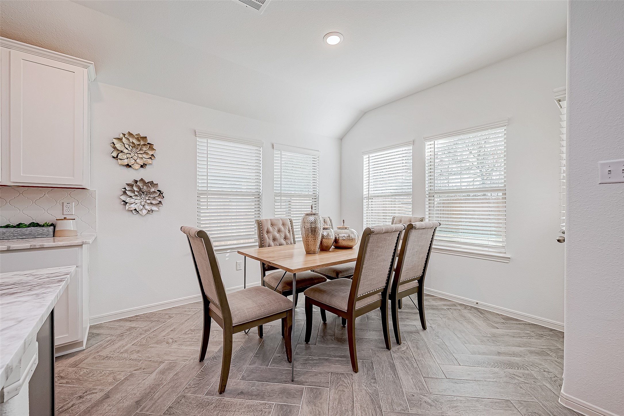 15941 Cy Young Court Splendora, TX 77372 - Photo 15 of 37 a view of a dining room with furniture window and wooden floor