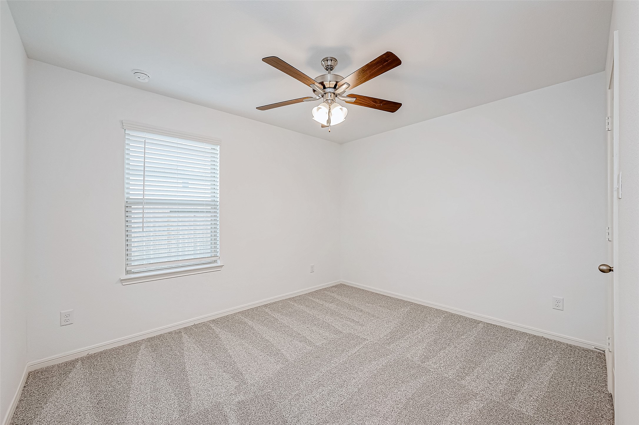 15941 Cy Young Court Splendora, TX 77372 - Photo 20 of 37 a view of an empty room with a window