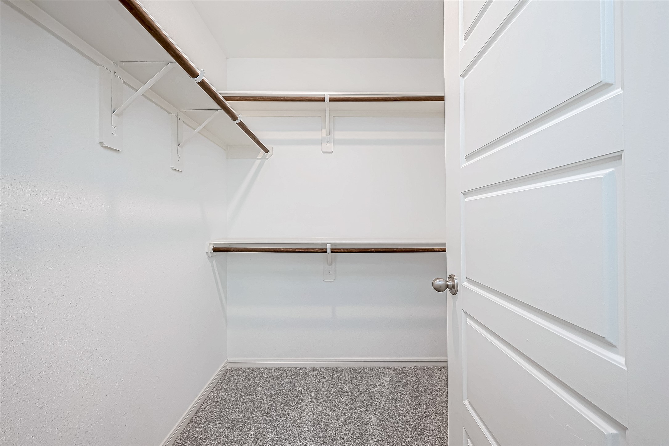 15941 Cy Young Court Splendora, TX 77372 - Photo 27 of 37 a view of an empty walk in closet
