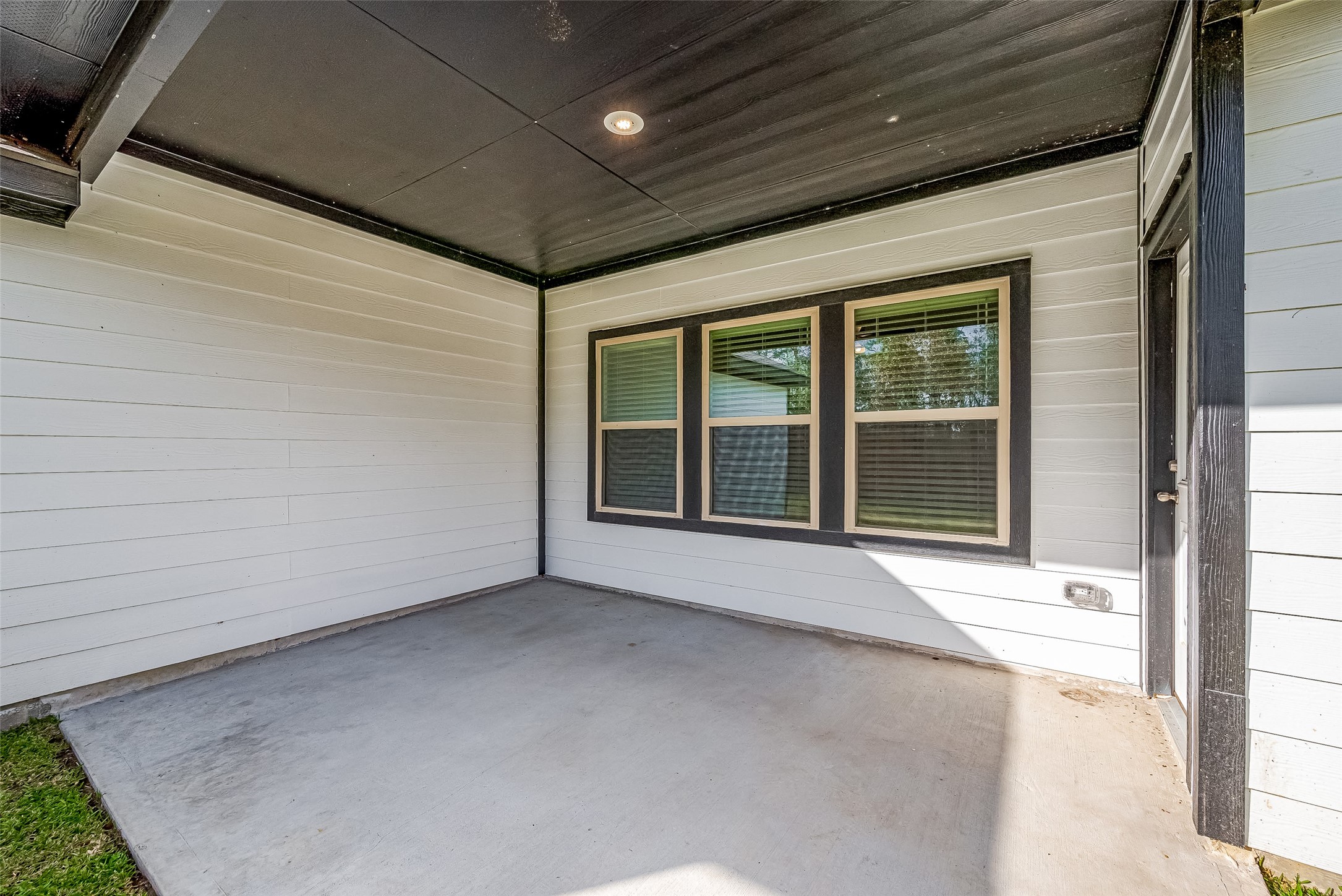15941 Cy Young Court Splendora, TX 77372 - Photo 31 of 37 a view of an empty room with a window