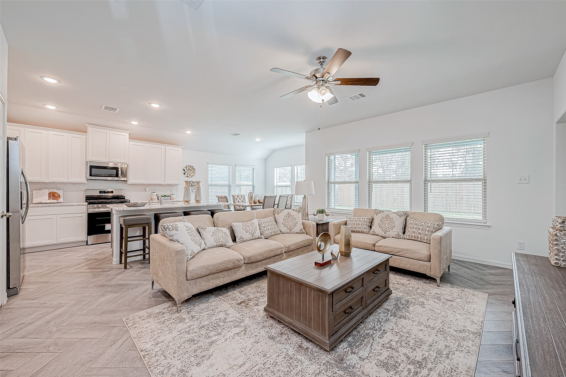 15941 Cy Young Court Splendora, TX 77372 - Photo 7 of 37 a living room with furniture and kitchen view