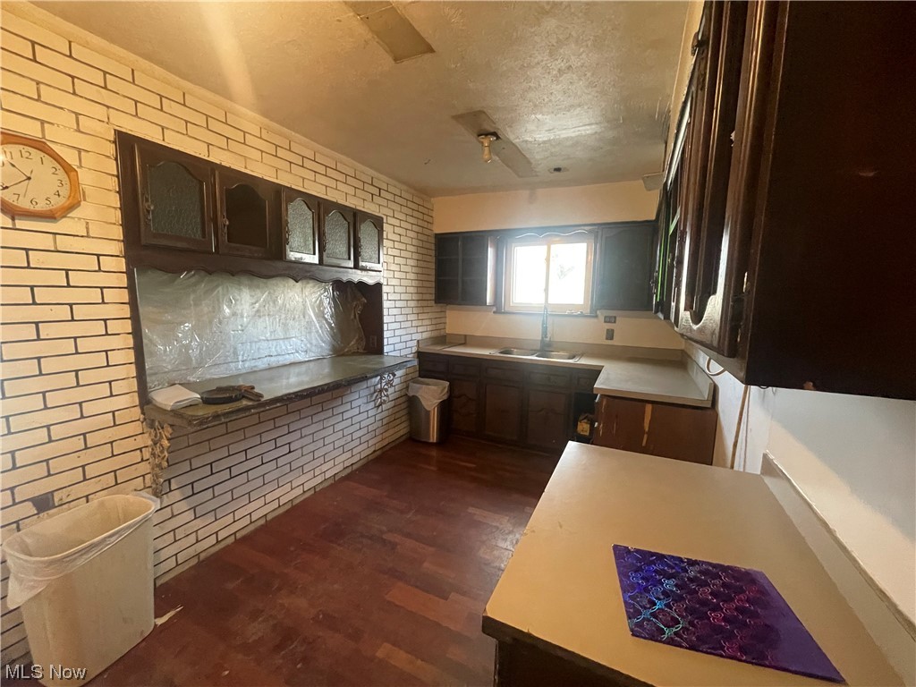 1909 West Schaaf Road Cleveland, OH 44109 - Photo 3 of 48 Kitchen breakfast bar with access to enclosed porch