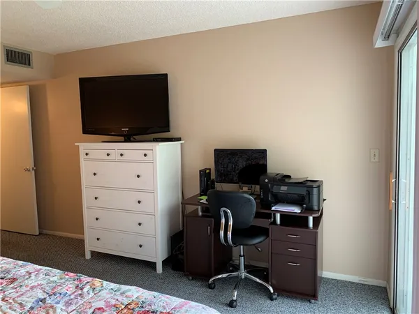 a view of a livingroom with furniture