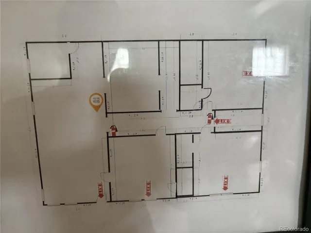 a white refrigerator freezer sitting inside of a kitchen