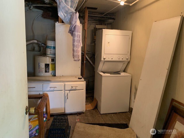 13076 Renton Avenue South Renton, WA 98178 - Photo 12 of 15 a room with cabinets and a refrigerator