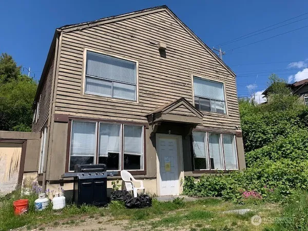 a front view of a house with patio