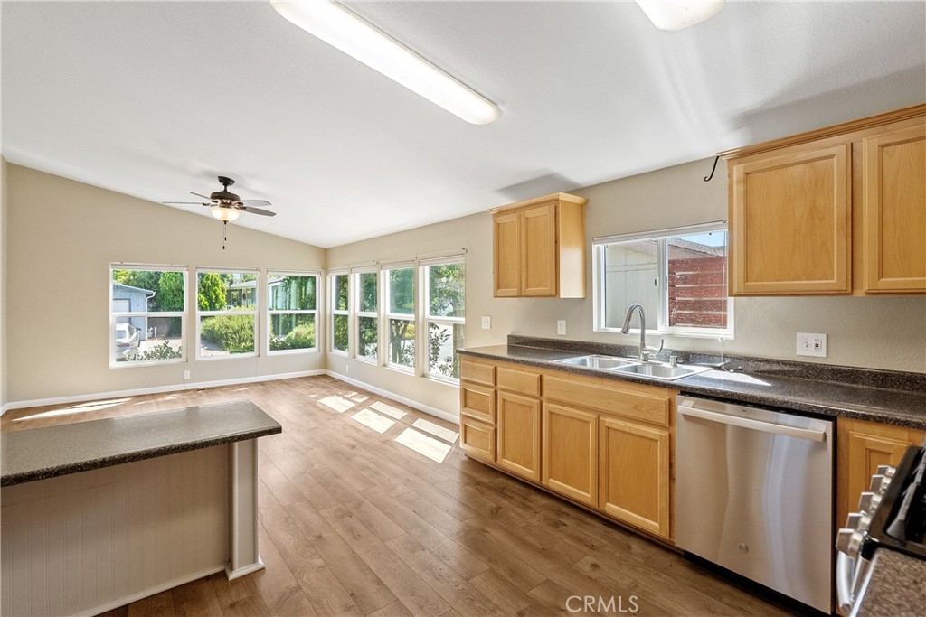 1220 Bennett Way, Unit 2 Templeton, CA 93465 - Photo 11 of 43 Breakfast bar completes the family room/kitchen, stainless steel appliances (same picture as the prior picture w/o virtual staging)