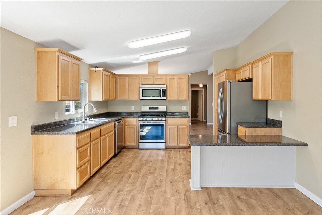 1220 Bennett Way, Unit 2 Templeton, CA 93465 - Photo 14 of 43 Remodeled kitchen is perfect for cooking and entertaining, 5 burner gas range, lots of counter space