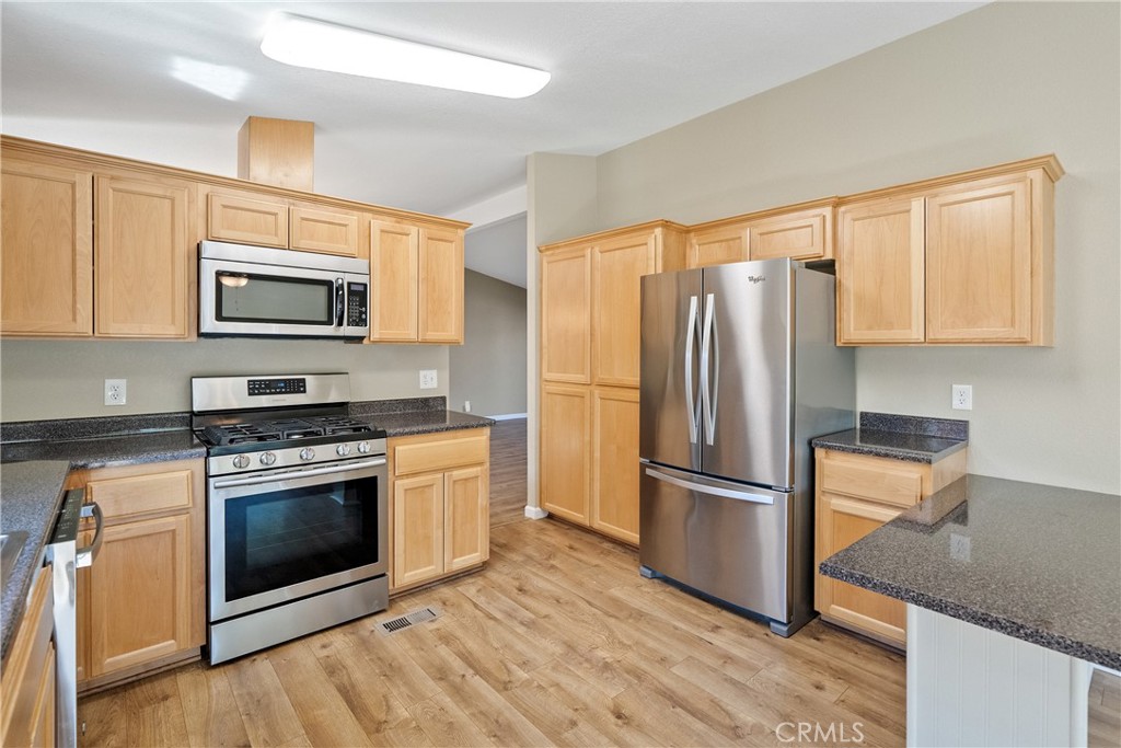 1220 Bennett Way, Unit 2 Templeton, CA 93465 - Photo 15 of 43 Highlights include stainless steel appliance suite and elegant cabinetry