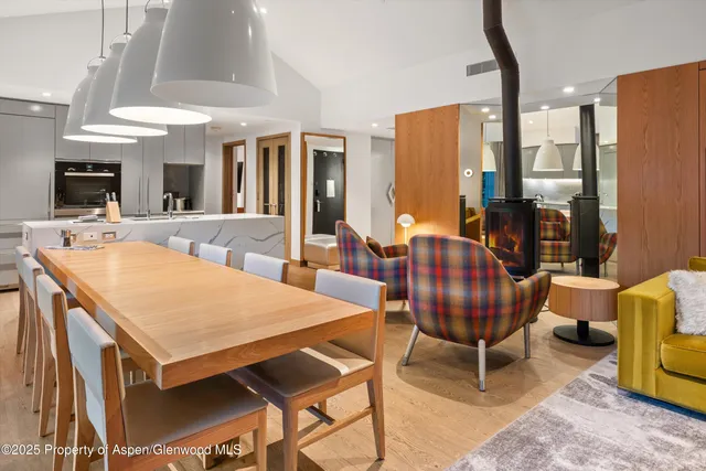 a kitchen with a sink a stove and a refrigerator