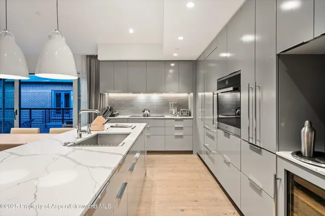 a bathroom with a bathtub and sink