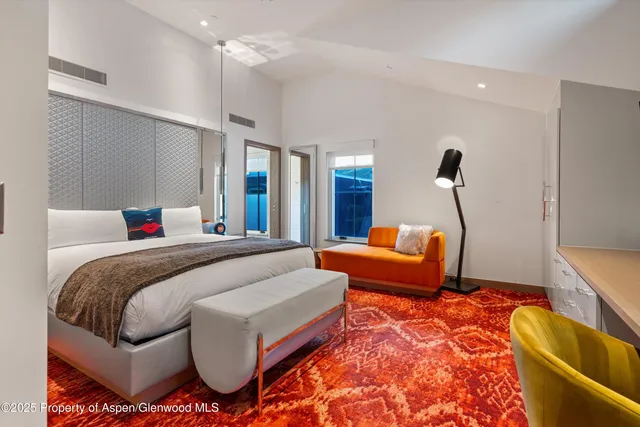 a bathroom with a double vanity sink and mirror