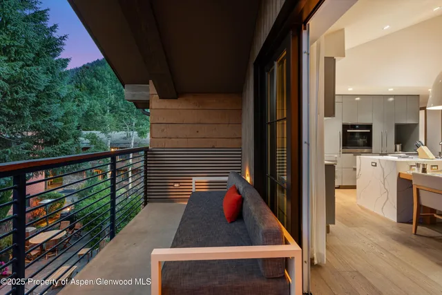 a view of swimming pool from a balcony