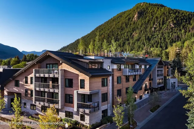 a outdoor space with patio couches coffee table and chairs