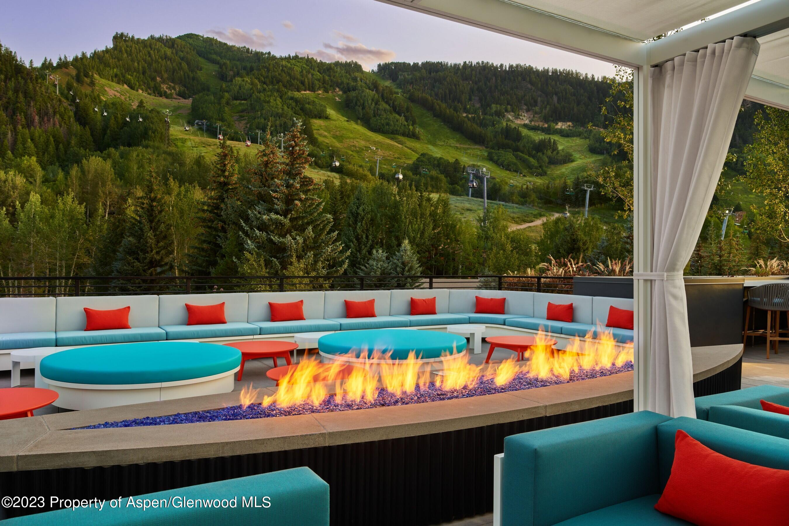 550 South Spring Street, Unit F10 110 Aspen, CO 81611 - Photo 48 of 58 a view of swimming pool from a balcony