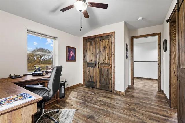 a bathroom with a toilet and a bathtub