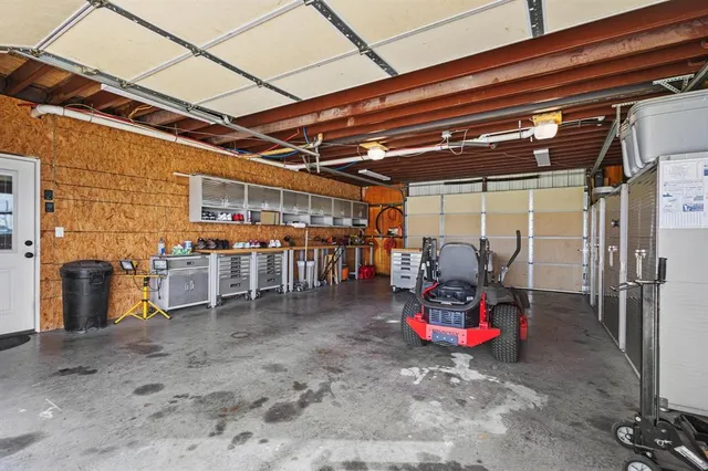 a view of a big room with table and chairs