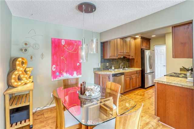 $435,000 | 5021 Ripley Lane North, Unit 102, Renton, WA 98056