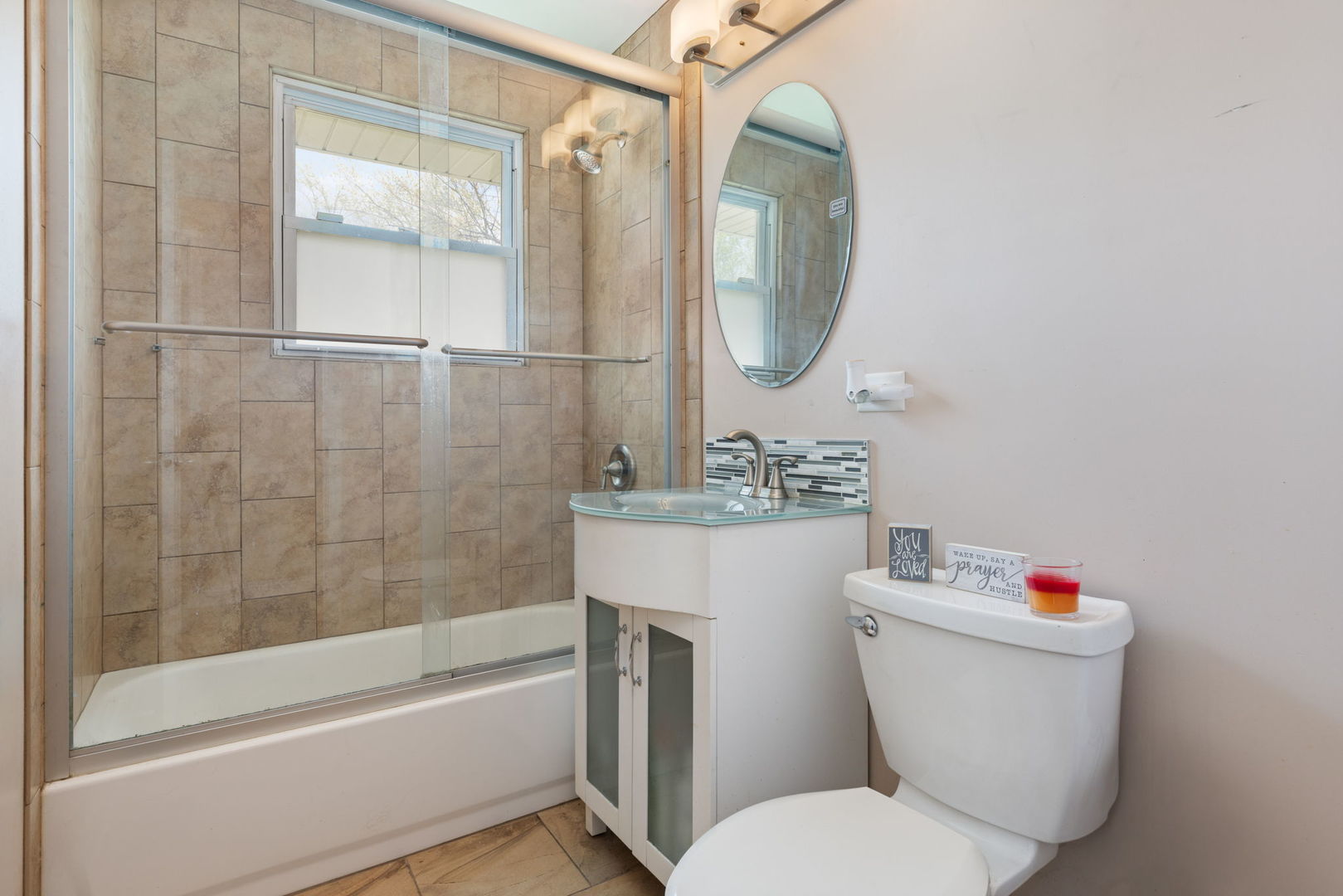 575 Aztec Drive Carol Stream, IL 60188 - Photo 14 of 20 a bathroom with a toilet sink and a mirror