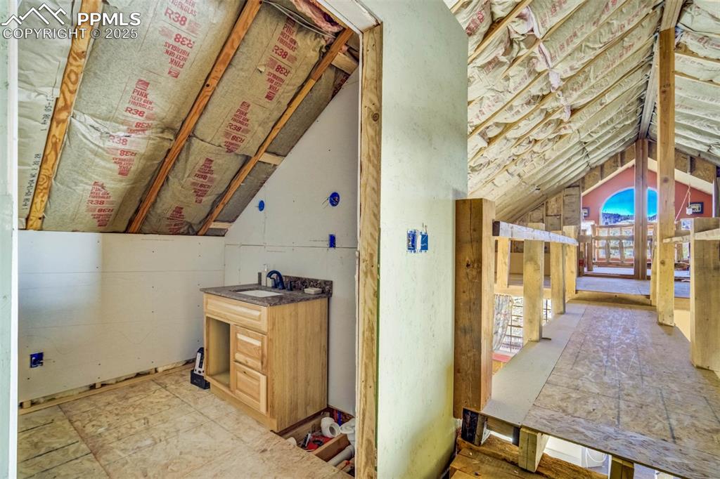 1440 Range Road Guffey, CO 80820 - Photo 26 of 50 a view of an entryway with wooden floor