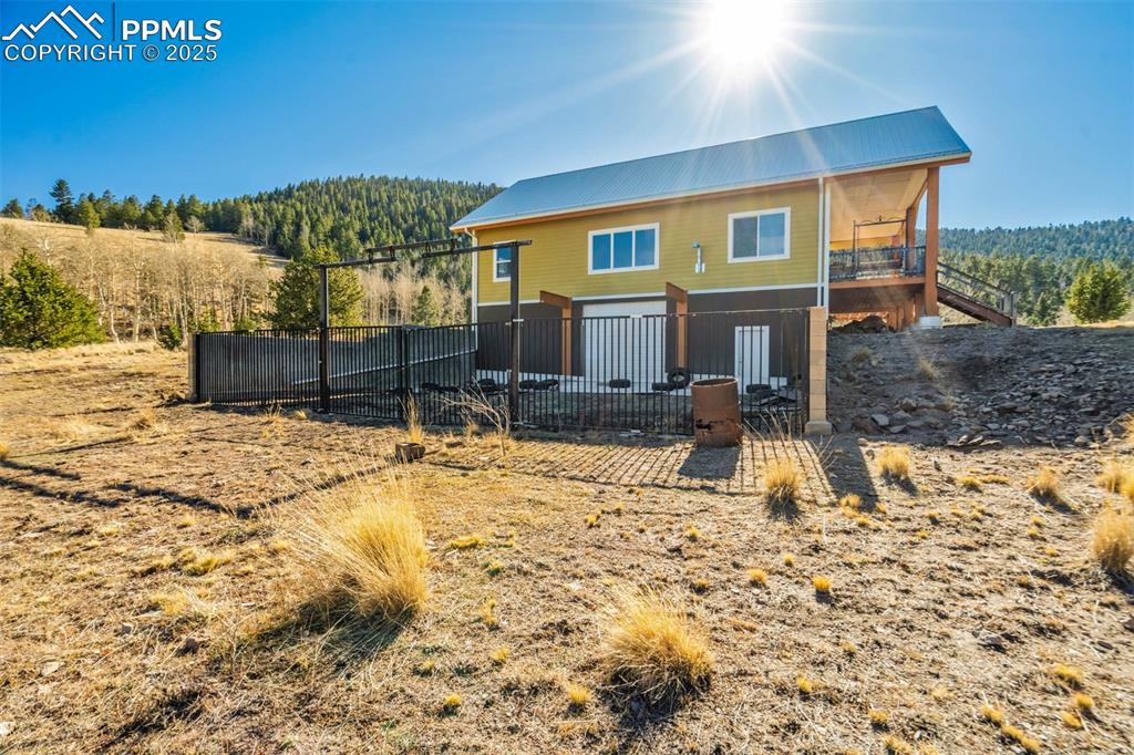 1440 Range Road Guffey, CO 80820 - Photo 41 of 50 a view of a house with a yard