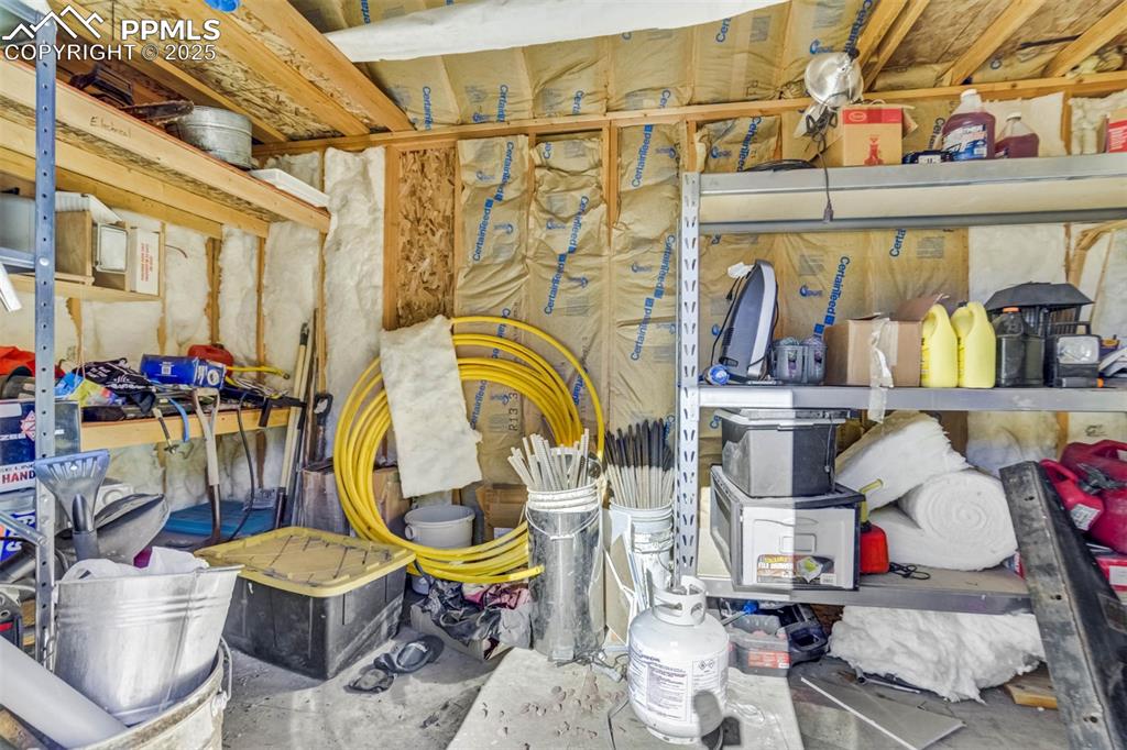 1440 Range Road Guffey, CO 80820 - Photo 46 of 50 a room with lots of different colored cloths