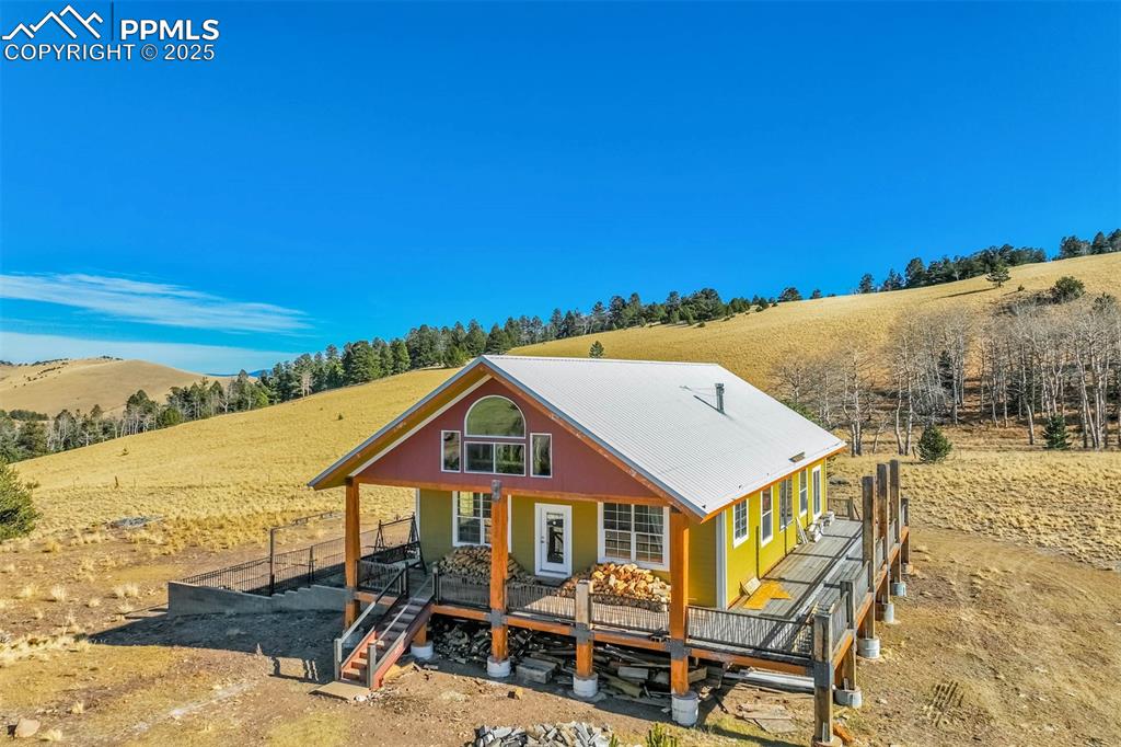 1440 Range Road Guffey, CO 80820 - Photo 6 of 50 a aerial view of a house with a big yard