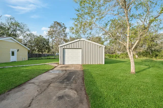 a view of backyard with green space