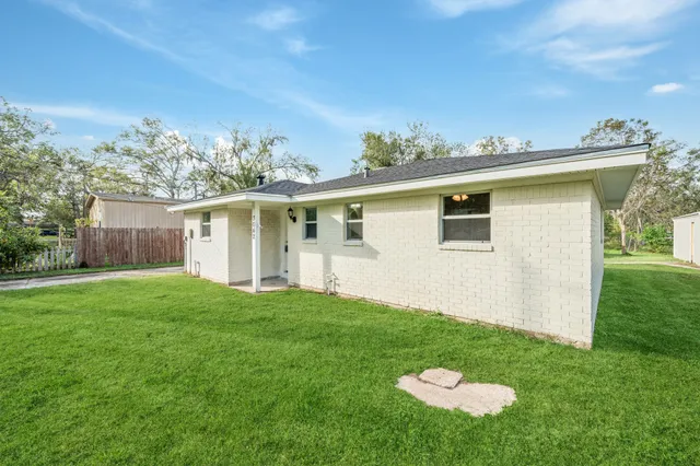 a view of a backyard with a garden