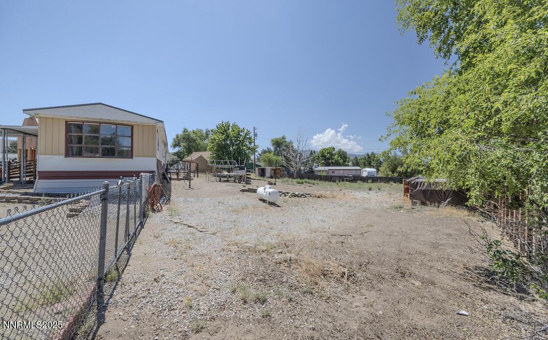 17530 Thrush Lane Reno, NV 89508 - Photo 14 of 25 a view of a house with wooden fence