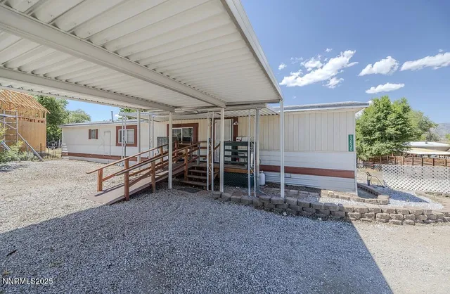 a view of a room with furniture