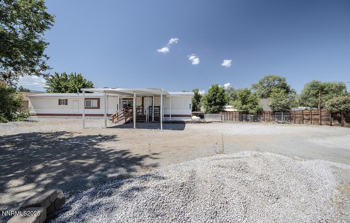 17530 Thrush Lane Reno, NV 89508 - Photo 2 of 25 a view of a house with a backyard