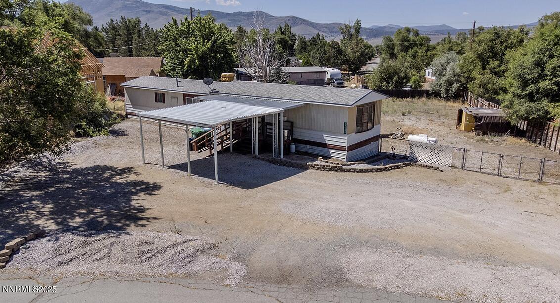 17530 Thrush Lane Reno, NV 89508 - Photo 3 of 25 a view of a patio with a table and chairs
