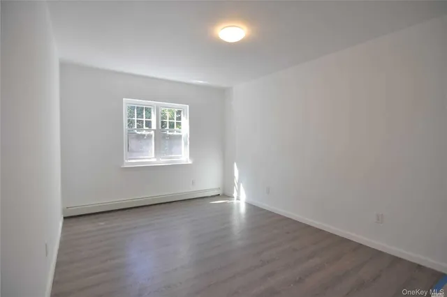 $860,000 | 59-32 164th Street | Queensboro Hill