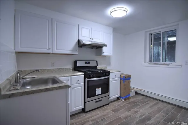 $860,000 | 59-32 164th Street | Queensboro Hill