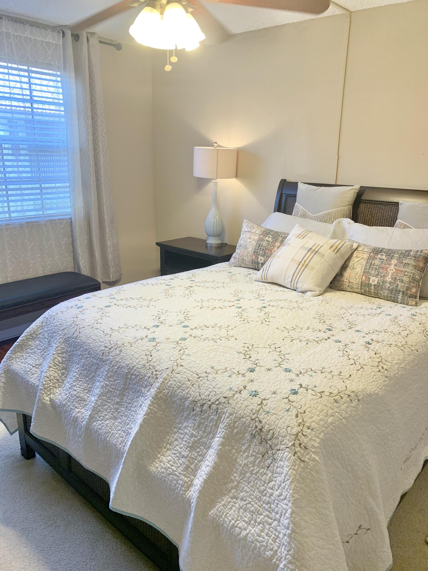 6663 Via Regina Boca Raton, FL 33433 - Photo 8 of 16 a bedroom with a bed and a window