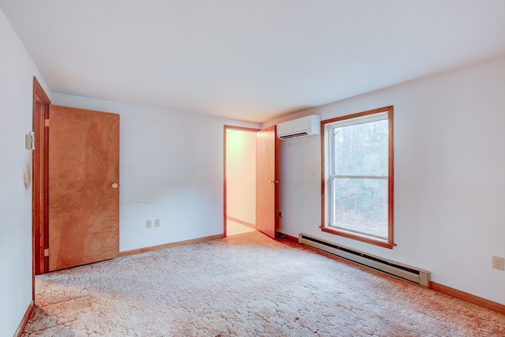 70 Ashburnham State Road Westminster, MA 01473 - Photo 19 of 32 an empty room with windows and closet