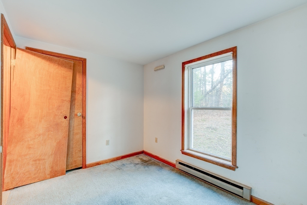 70 Ashburnham State Road Westminster, MA 01473 - Photo 27 of 32 a view of an empty room and window