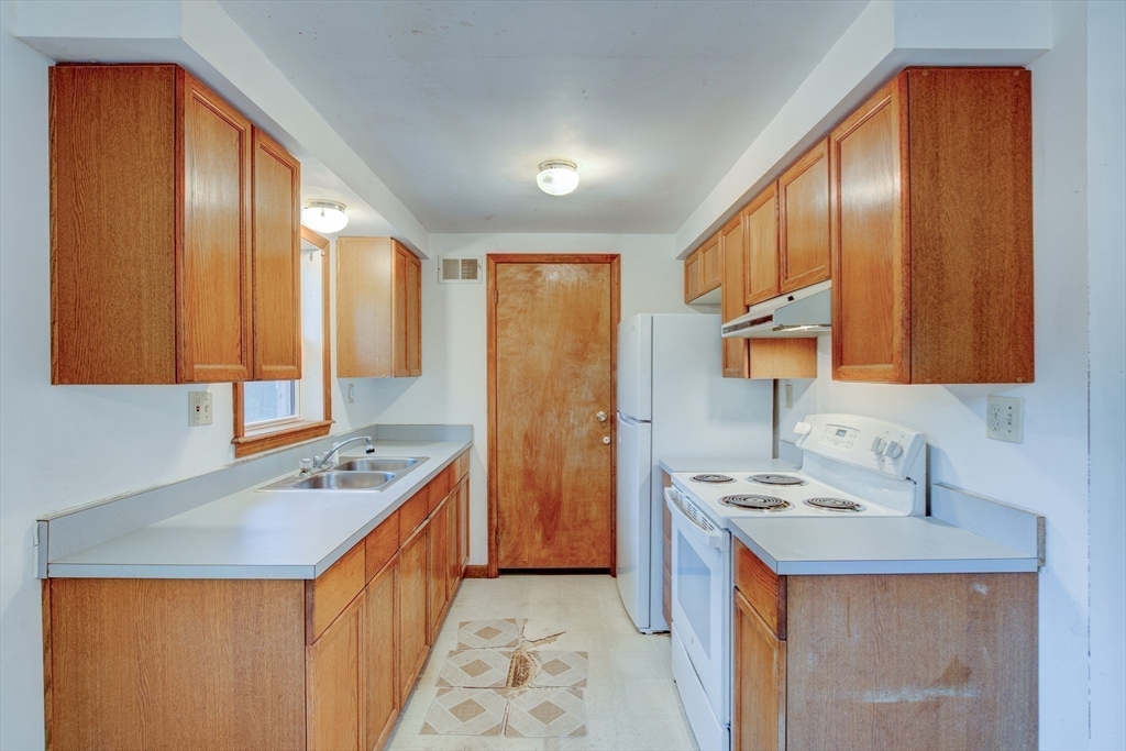 70 Ashburnham State Road Westminster, MA 01473 - Photo 3 of 32 a kitchen with stainless steel appliances granite countertop a sink stove and cabinets