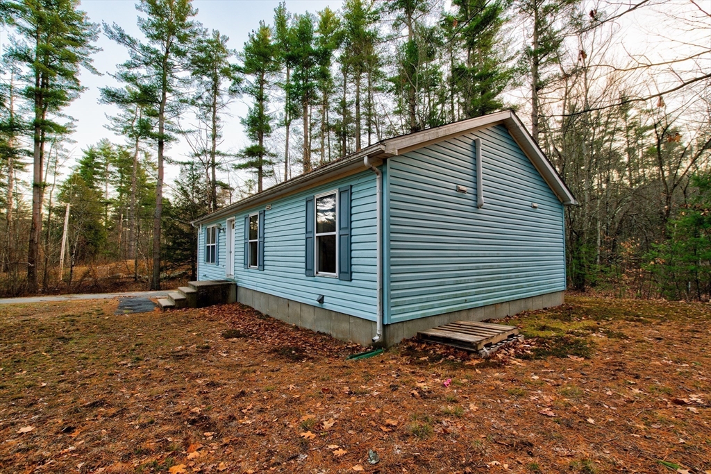 70 Ashburnham State Road Westminster, MA 01473 - Photo 32 of 32 a view of a house with a yard