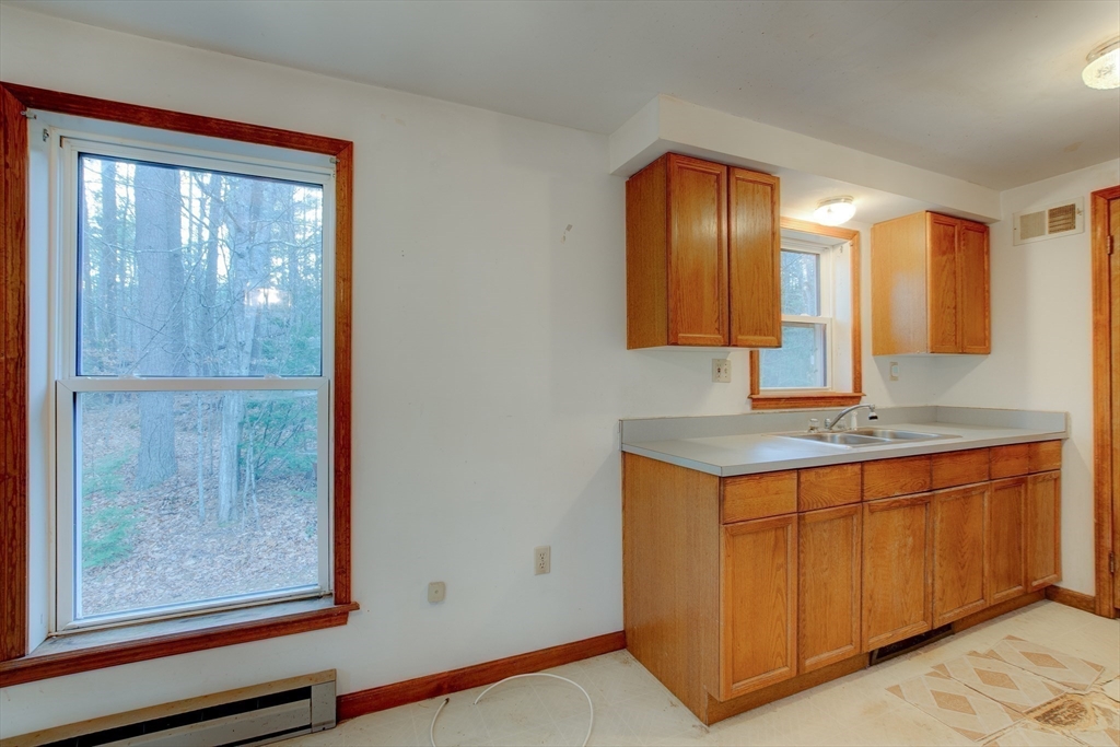70 Ashburnham State Road Westminster, MA 01473 - Photo 5 of 32 a bathroom with a sink and a mirror