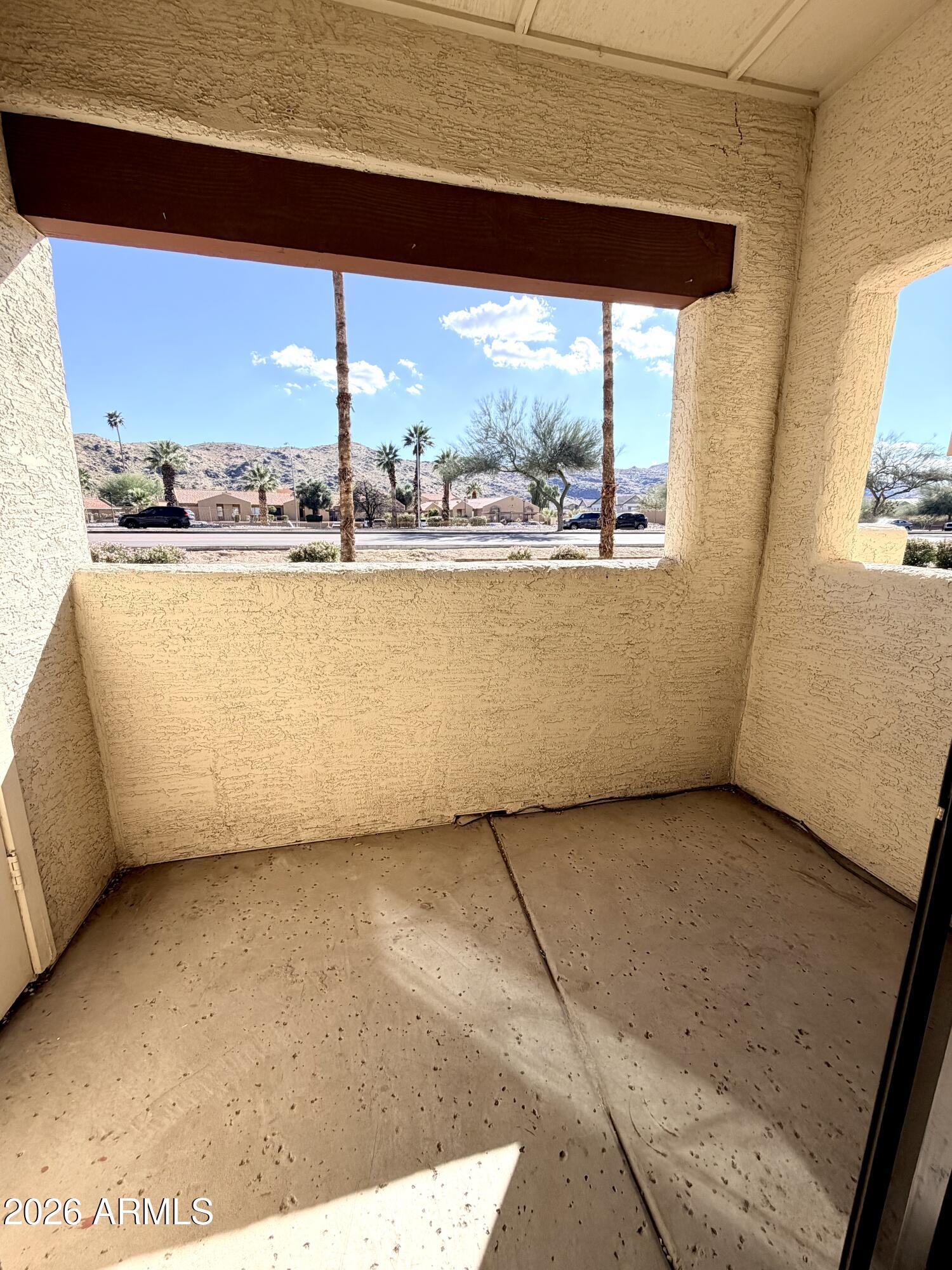 3434 East Baseline Road, Unit 165 Phoenix, AZ 85042 - Photo 12 of 12 a view of an empty room with a window