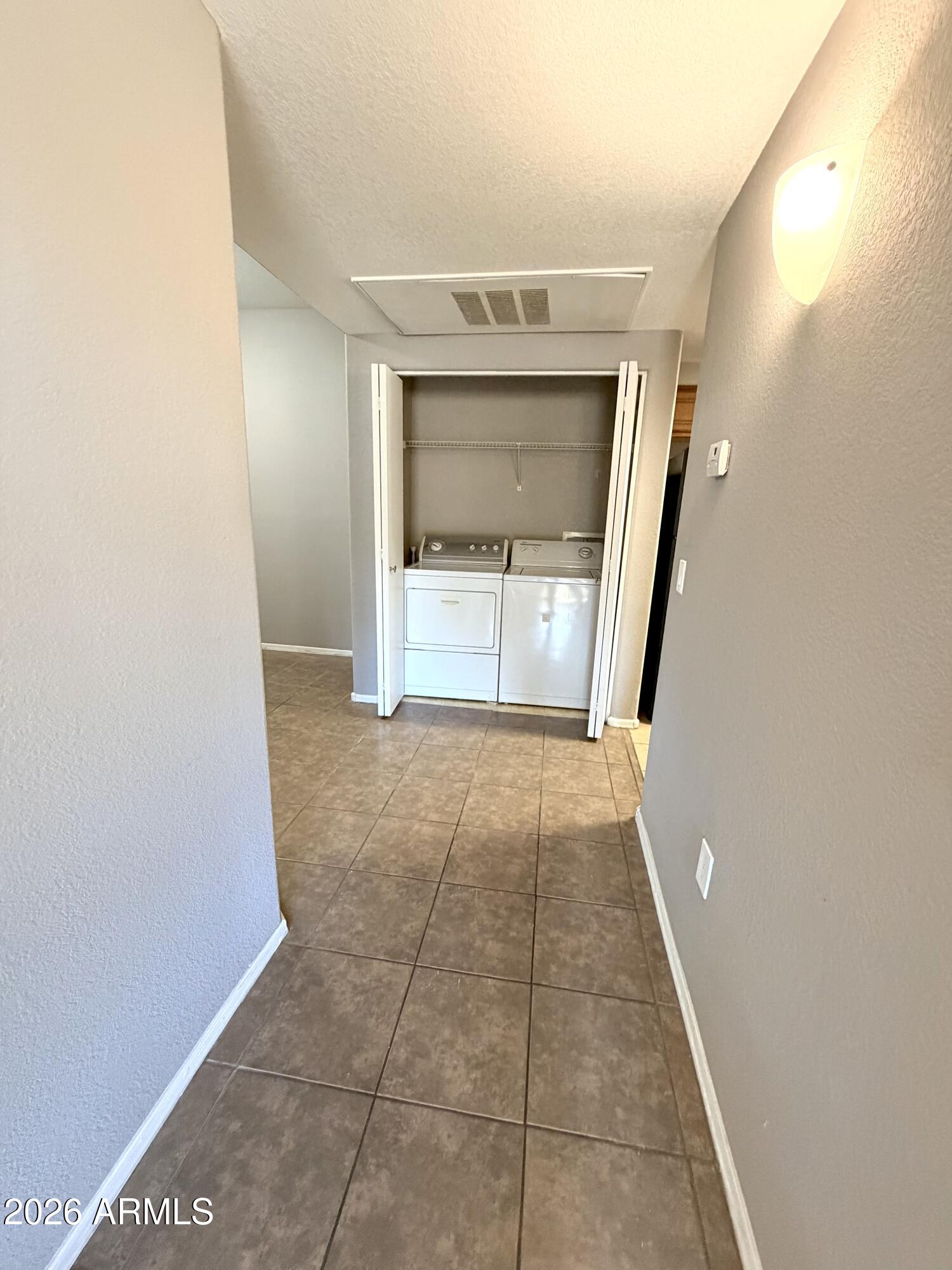 3434 East Baseline Road, Unit 165 Phoenix, AZ 85042 - Photo 4 of 12 a view of a hallway