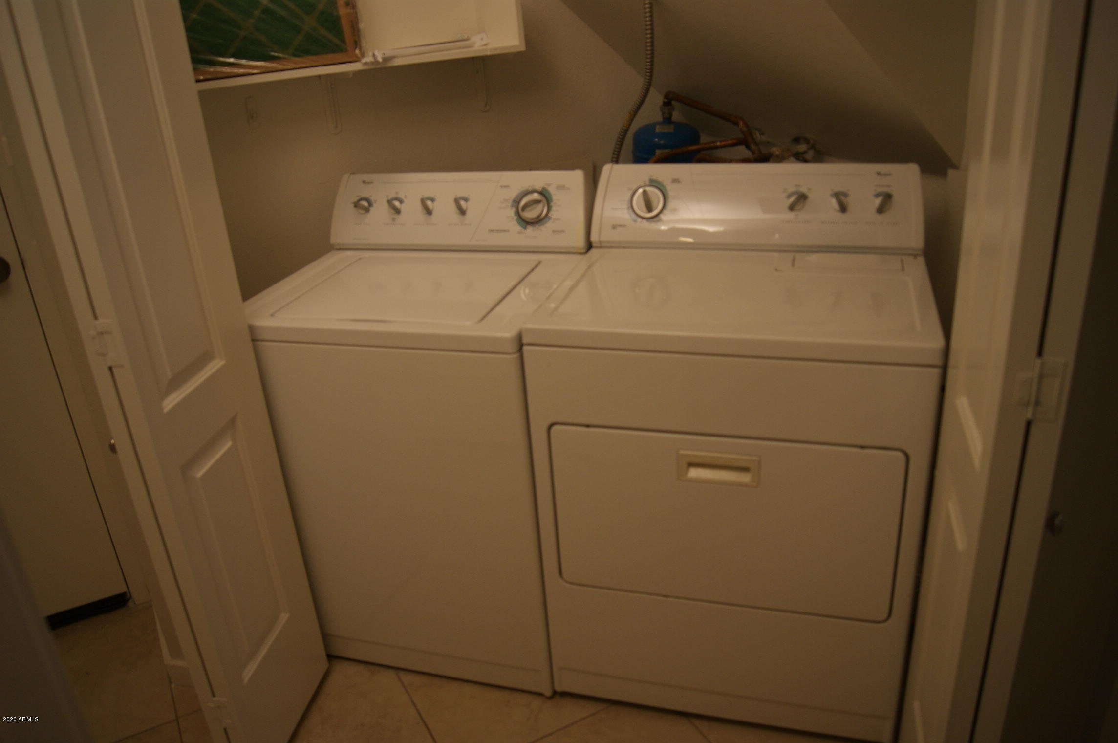 3633 North 3rd Avenue, Unit 1060 Phoenix, AZ 85013 - Photo 20 of 23 a close up view of washer and dryer