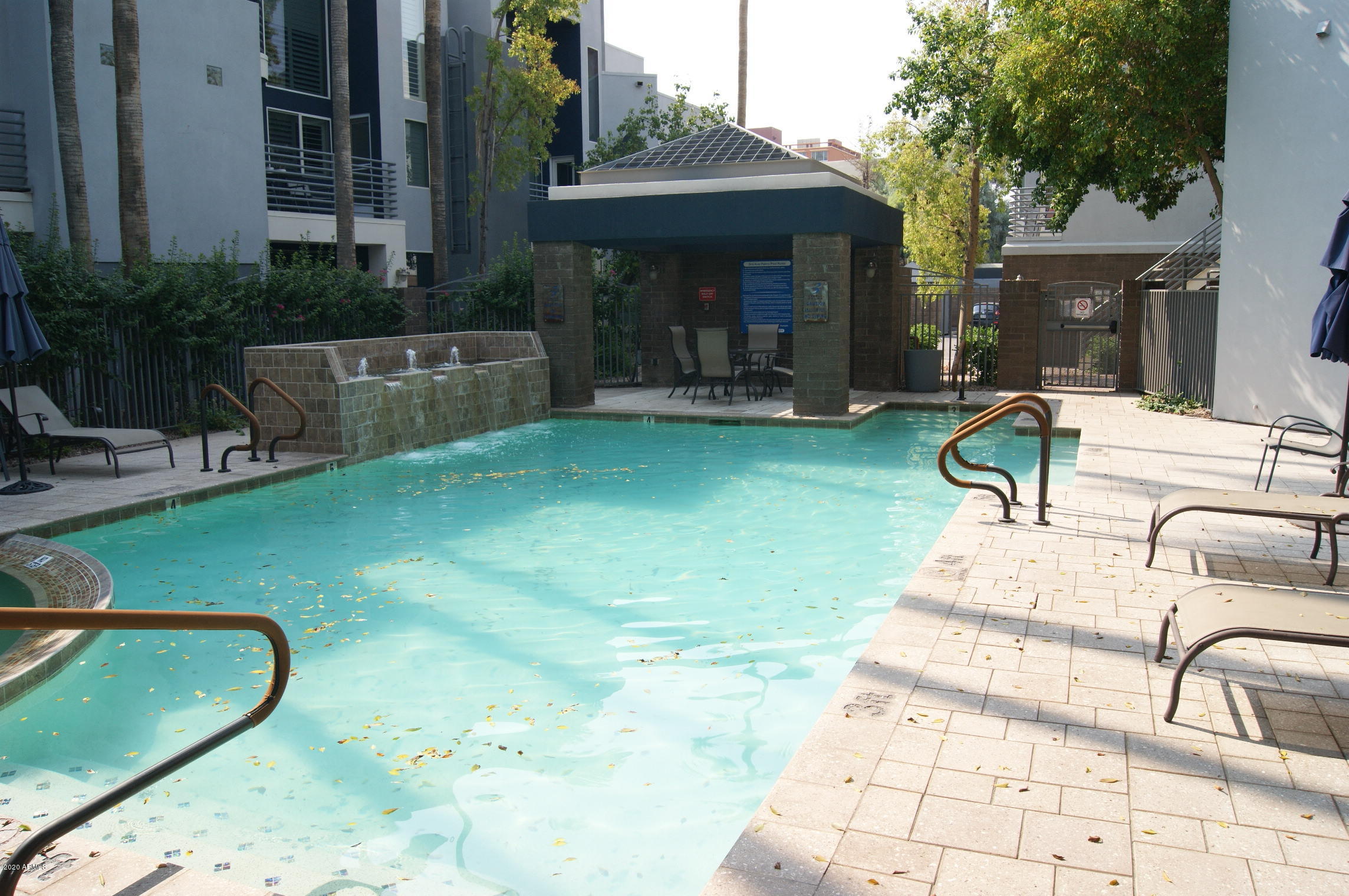 3633 North 3rd Avenue, Unit 1060 Phoenix, AZ 85013 - Photo 22 of 23 a view of a swimming pool with a patio