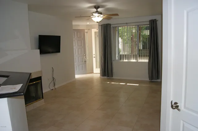 a view of livingroom with workspace