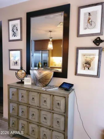 a view of hallway with mirror